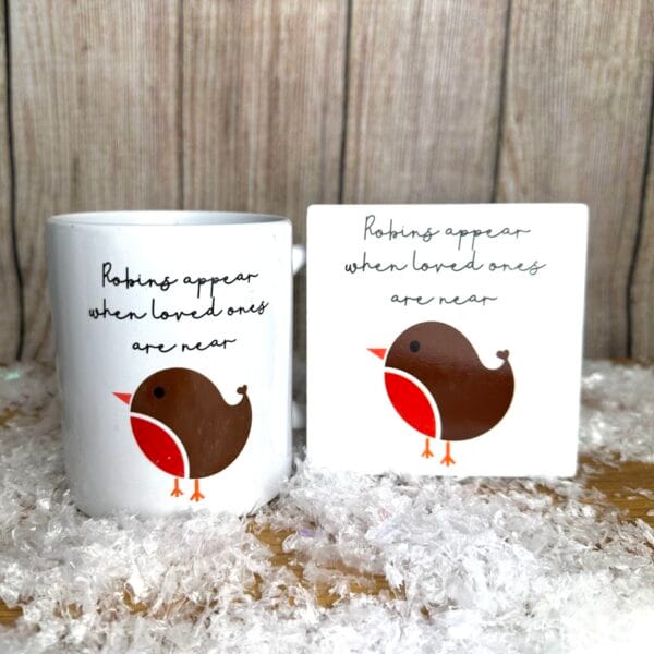 mug and coaster featuring robin image and wording robins appear when loved ones are near